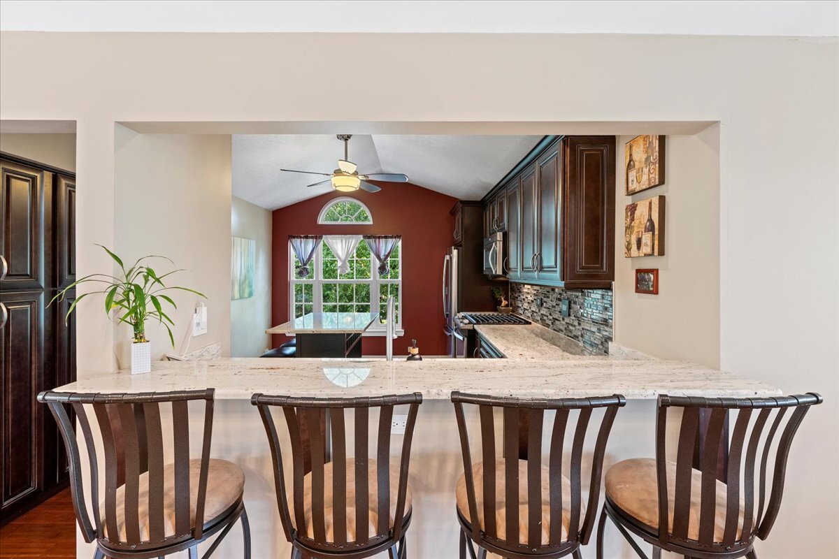 1636 Columbia Circle, Unit 2 Bartlett, IL 60103 - Photo 20 of 47 a view of a dining room with furniture window and outside view
