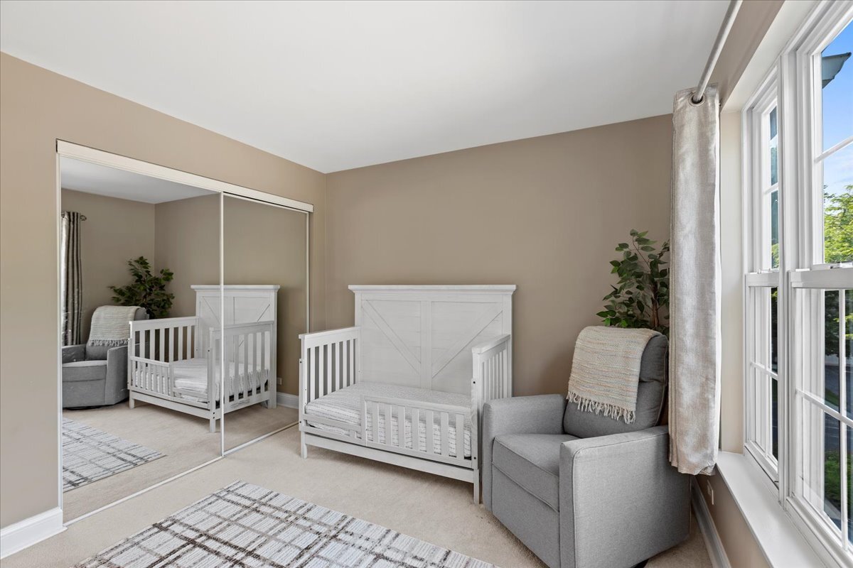 1636 Columbia Circle, Unit 2 Bartlett, IL 60103 - Photo 24 of 47 a living room with furniture and a window