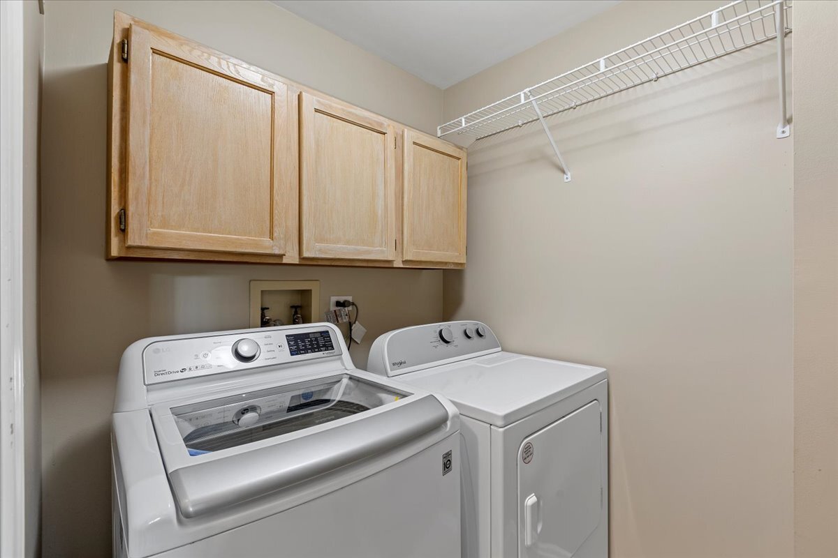 1636 Columbia Circle, Unit 2 Bartlett, IL 60103 - Photo 26 of 47 a utility room with dryer and washer