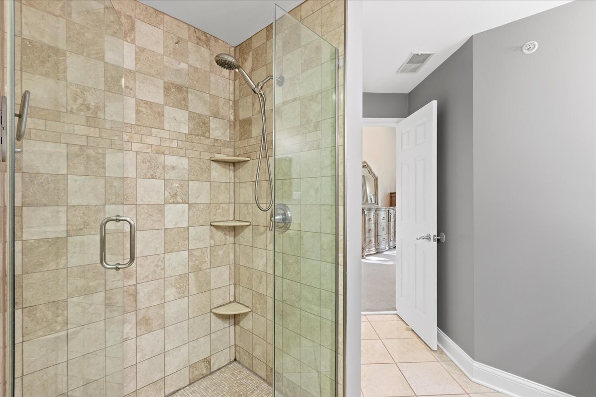 1636 Columbia Circle, Unit 2 Bartlett, IL 60103 - Photo 30 of 47 a bathroom with a shower