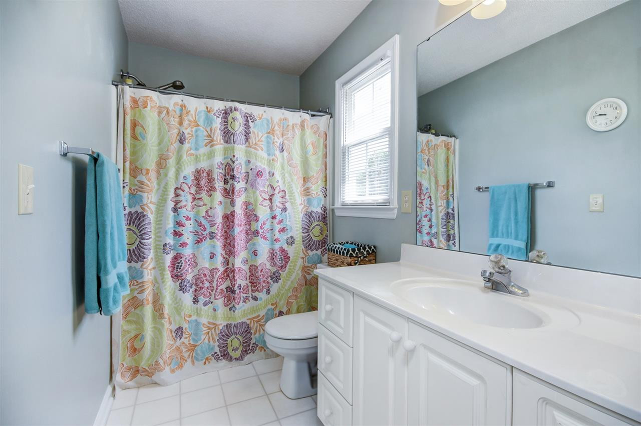 5300 Halcott Court Raleigh, NC 27613 - Photo 19 of 23 Jack & Jill full bathroom on 2nd floor has tub/shower combo. There is a linen closet and carbon monoxide detectors in the home as well. Bathroom
