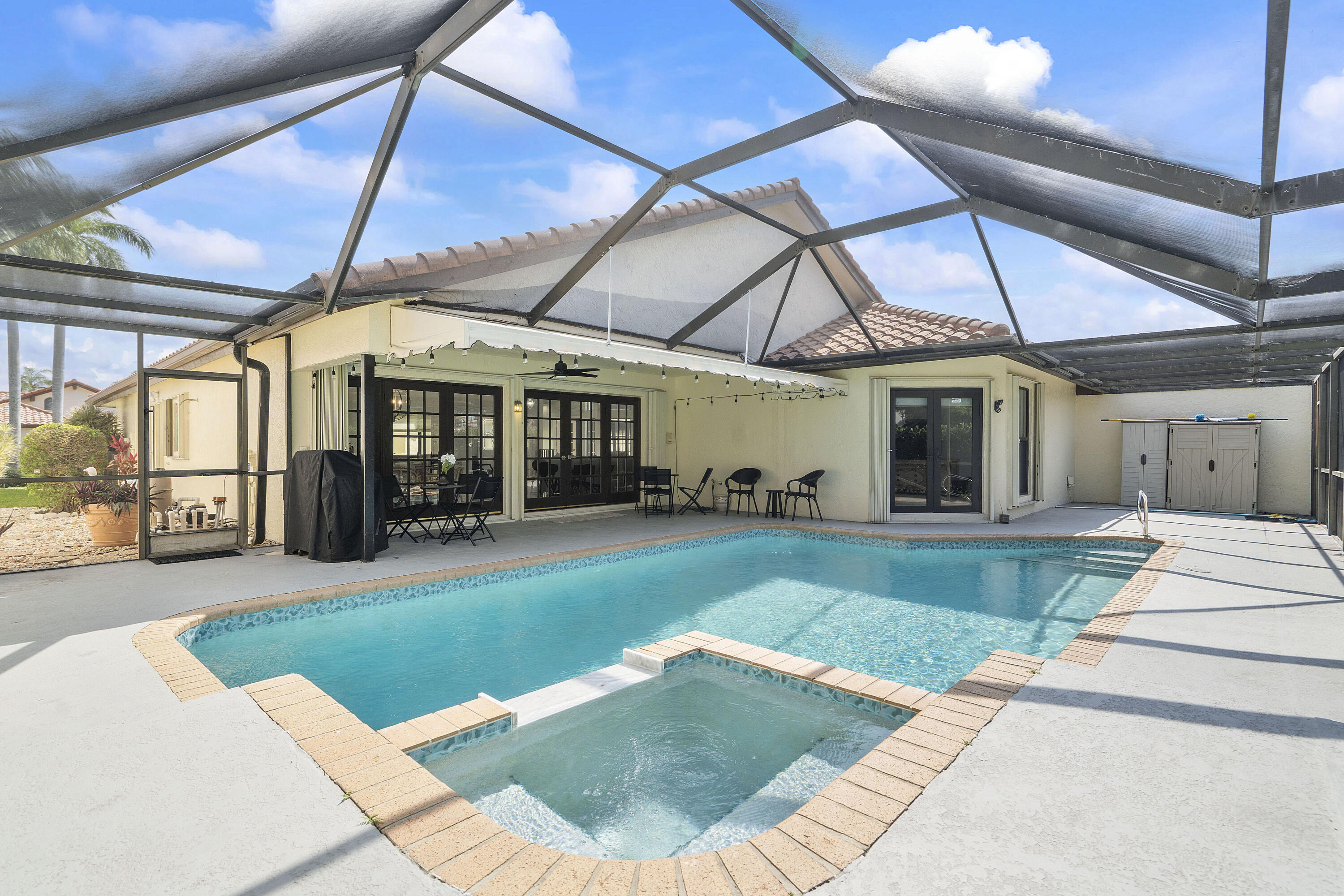 22652 Esplanada Circle Boca Raton, FL 33433 - Photo 17 of 44 a view of a house with a backyard