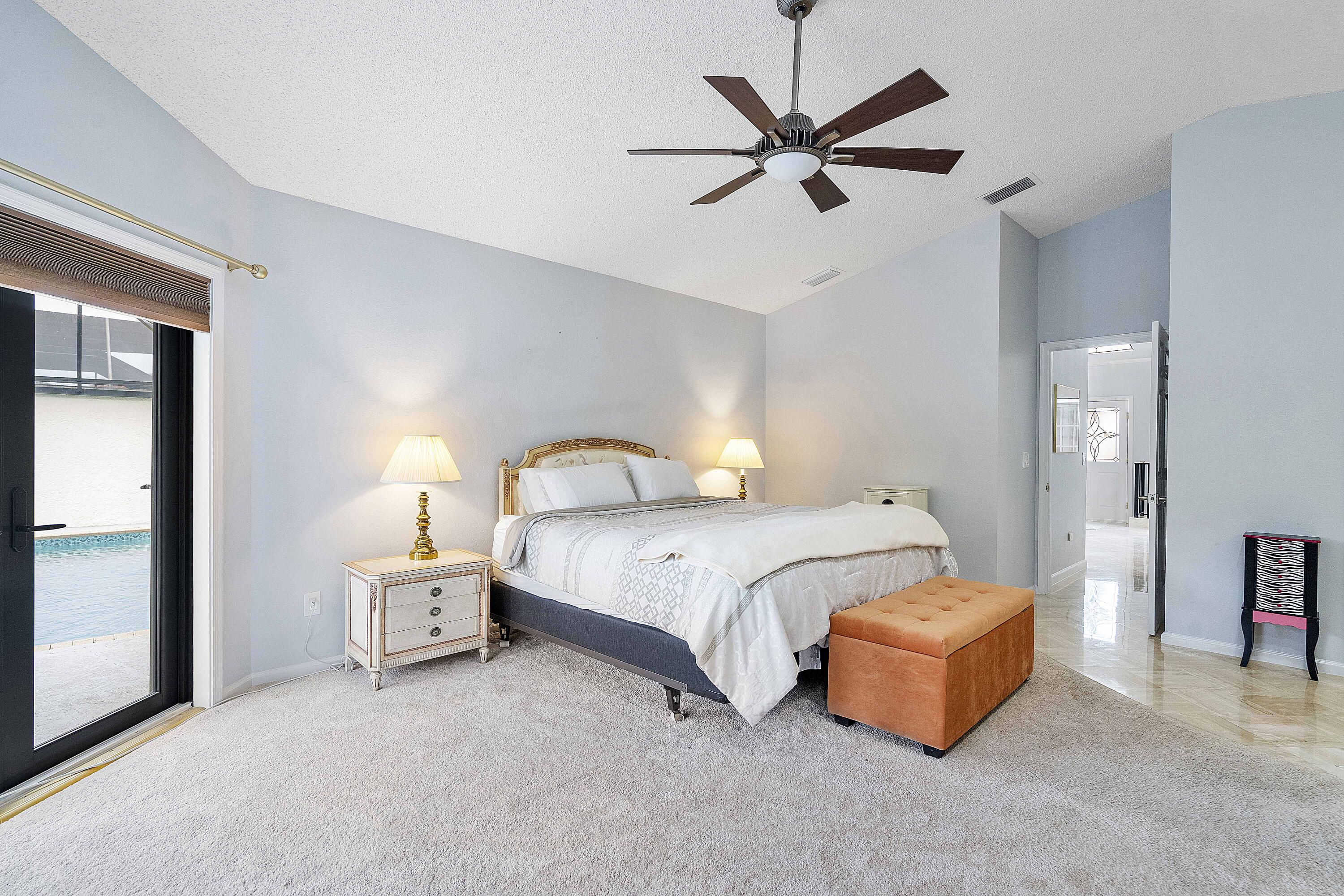 22652 Esplanada Circle Boca Raton, FL 33433 - Photo 20 of 44 a bedroom with bed and a large mirror