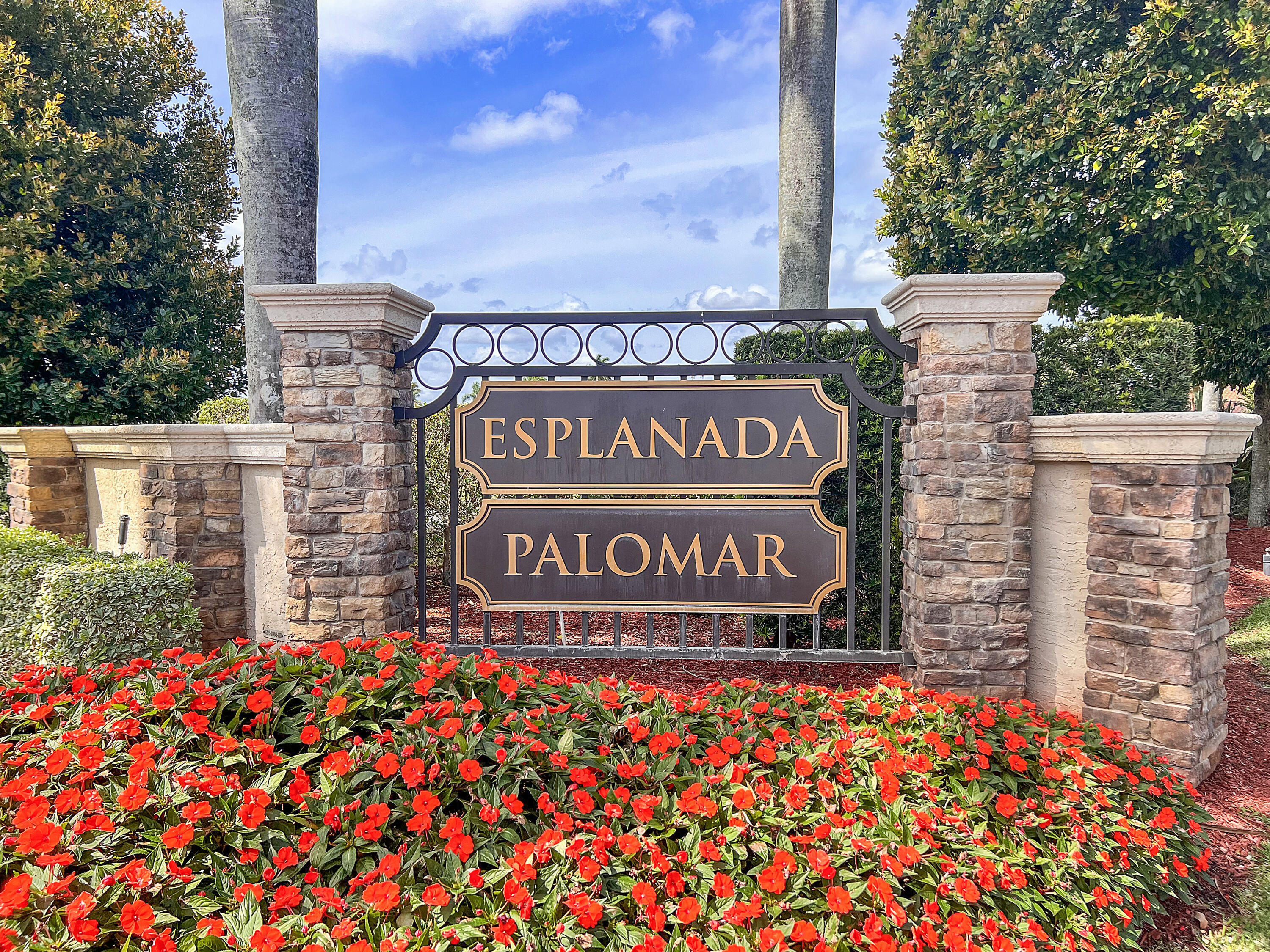 22652 Esplanada Circle Boca Raton, FL 33433 - Photo 2 of 44 a sign on the side of a building