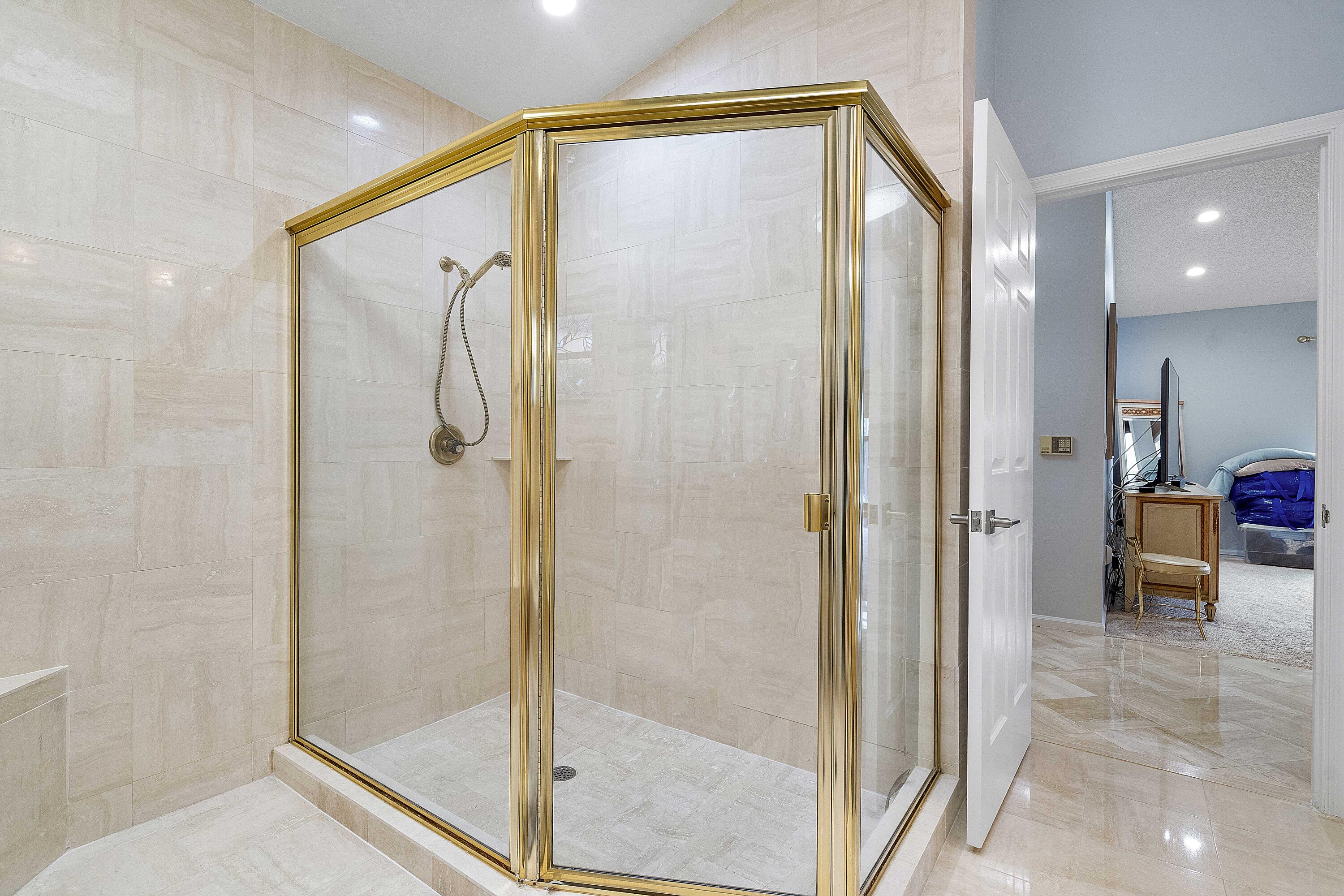 22652 Esplanada Circle Boca Raton, FL 33433 - Photo 26 of 44 a bathroom with a shower and a sink