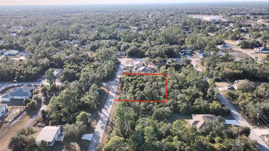 5 Countess Avenue North Port, FL 34288 - Photo 16 of 17 an aerial view of residential house with outdoor space and trees