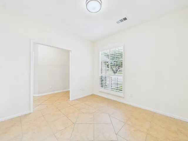 an empty room with windows