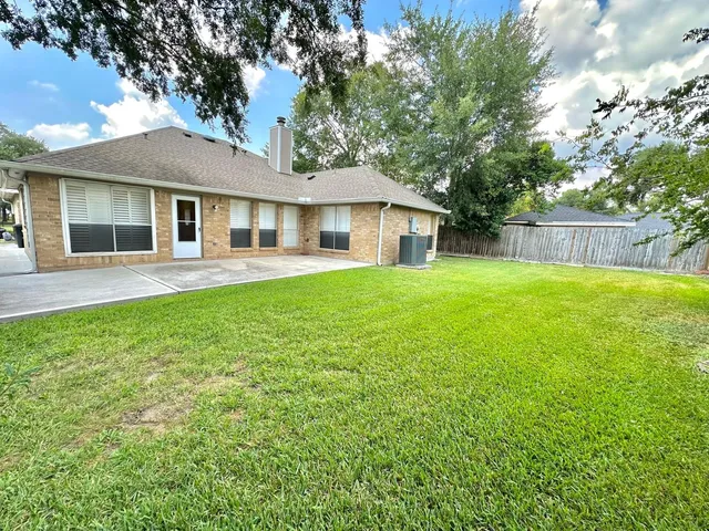 a view of a backyard with a garden