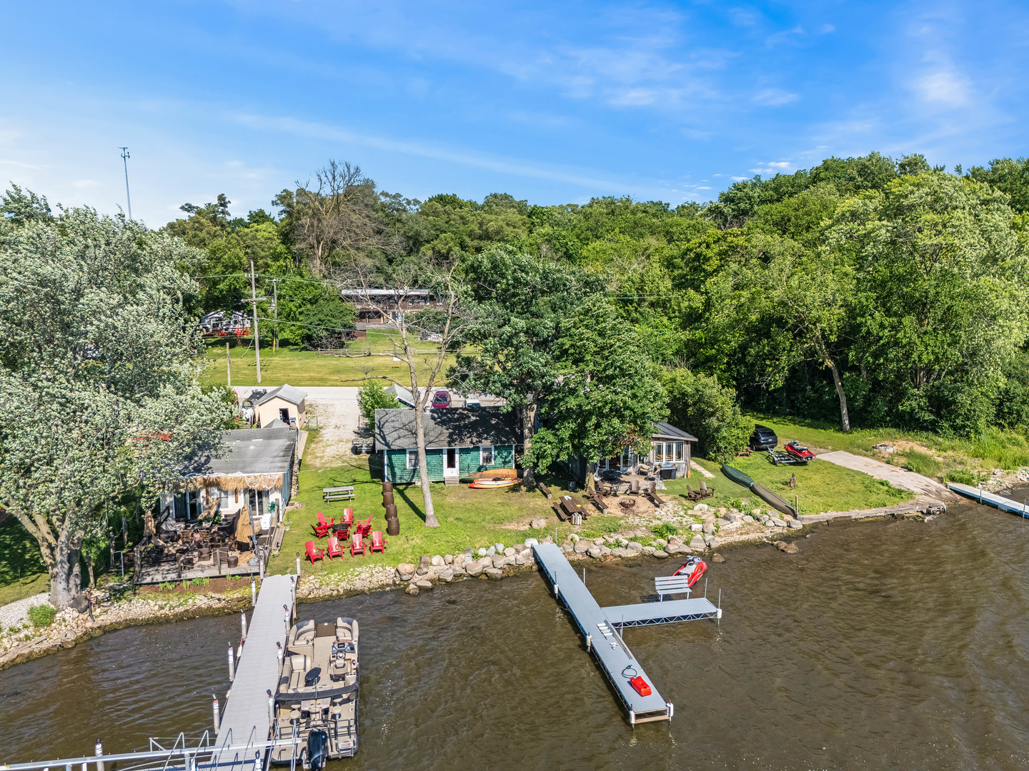 5-n092 Grove Avenue St. Charles, IL 60174 - Photo 18 of 20 an aerial view of a city with lots of residential buildings ocean and mountain view in back