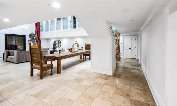a kitchen with stainless steel appliances kitchen island granite countertop a refrigerator and stove top oven