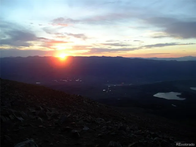 a view of a lake with a yard