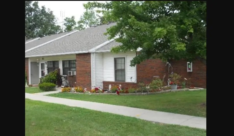 8 Senior Drive Greenwich, OH 44837 - Photo 3 of 7 a front view of a house with a yard and tree
