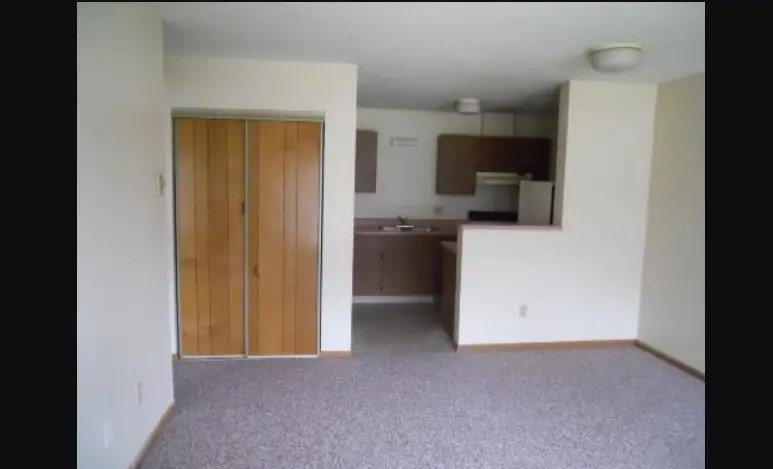 8 Senior Drive Greenwich, OH 44837 - Photo 6 of 7 a view of a kitchen with a sink and a refrigerator