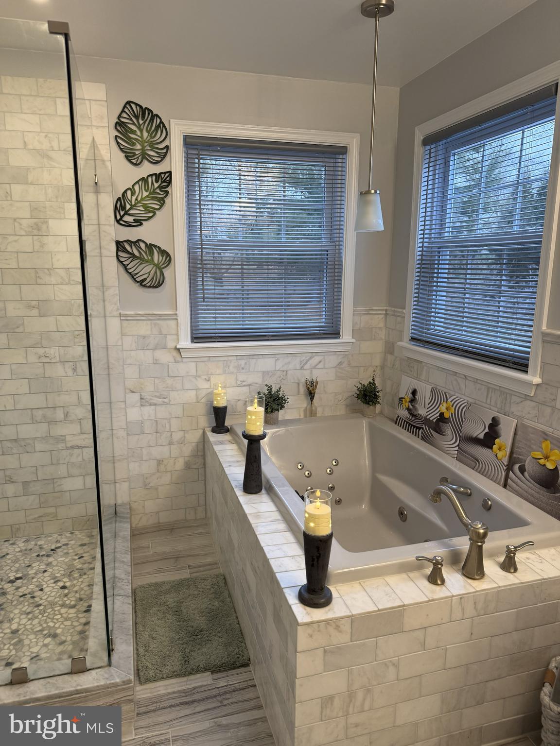239 Heather Ridge Circle West Chester, PA 19382 - Photo 20 of 54 a bathroom with a sink a mirror and shower