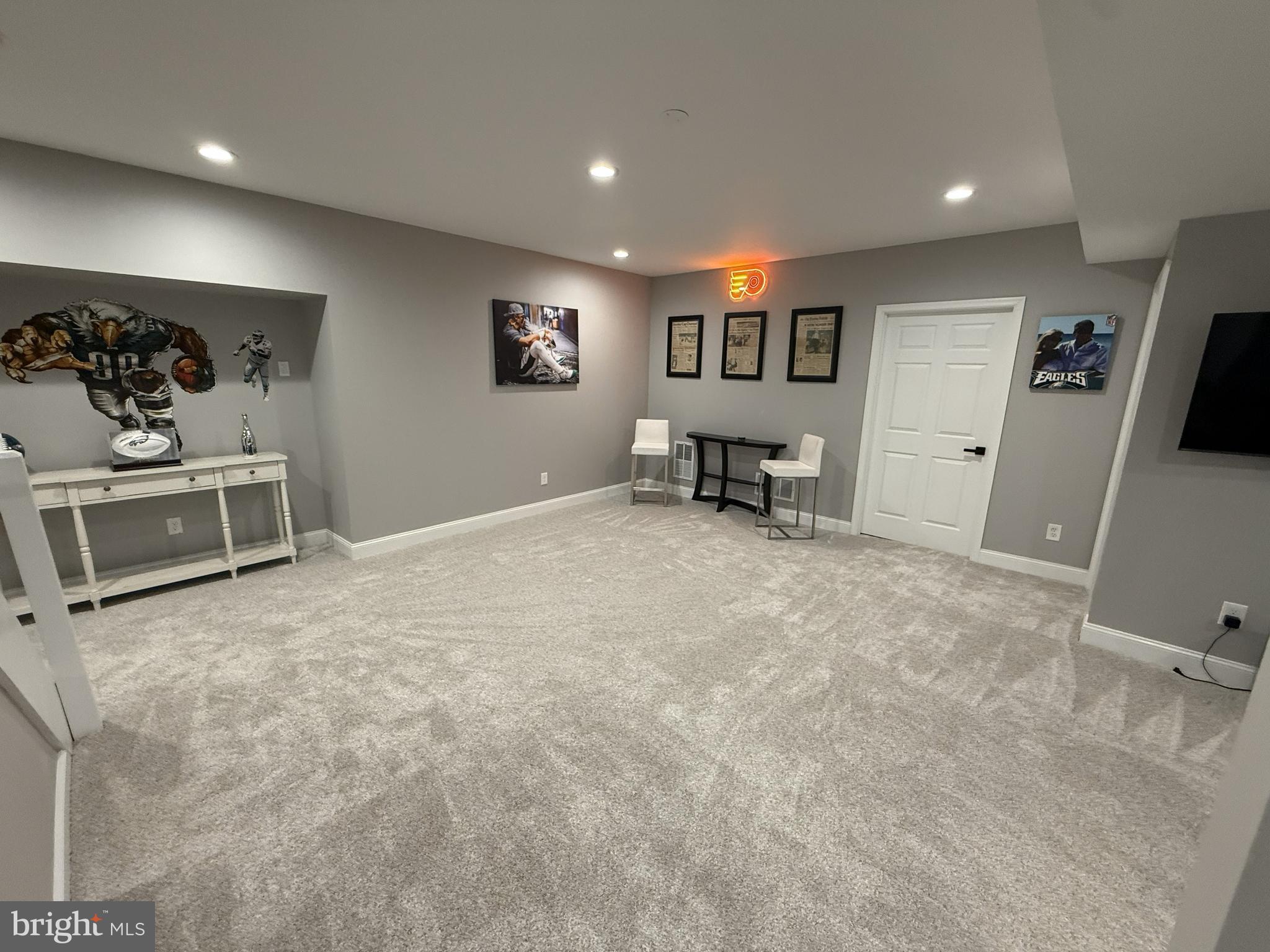 239 Heather Ridge Circle West Chester, PA 19382 - Photo 25 of 54 a view of a livingroom with furniture and a flat screen tv