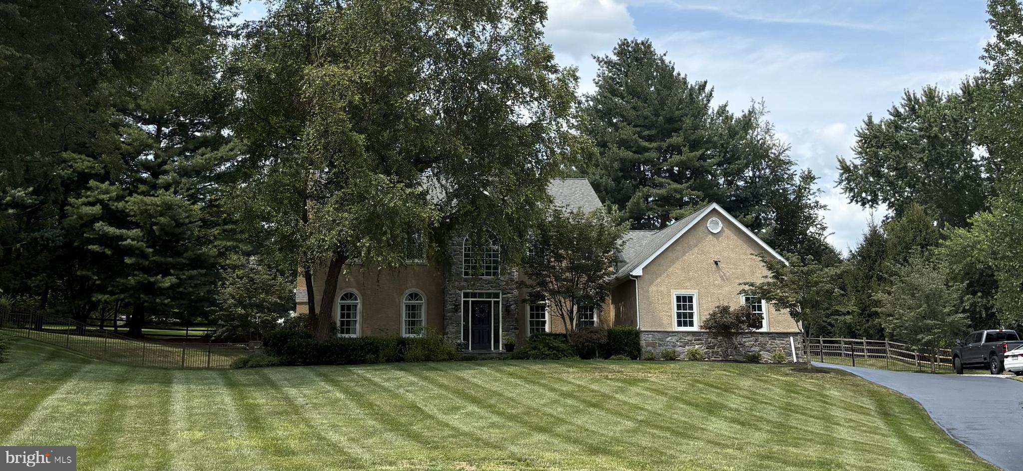 239 Heather Ridge Circle West Chester, PA 19382 - Photo 3 of 54 a view of a house with a yard