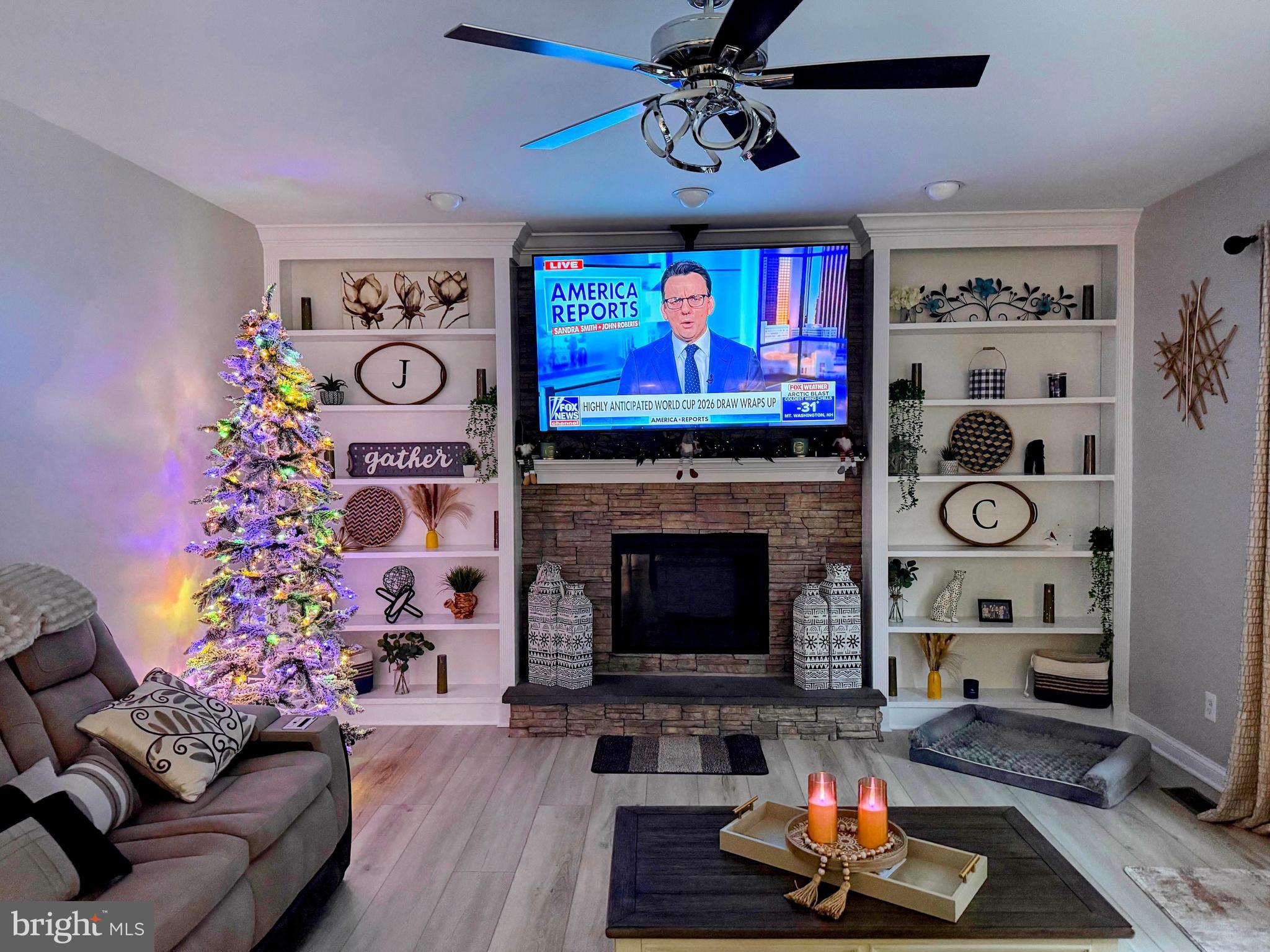 239 Heather Ridge Circle West Chester, PA 19382 - Photo 31 of 54 a living room with furniture and a fireplace