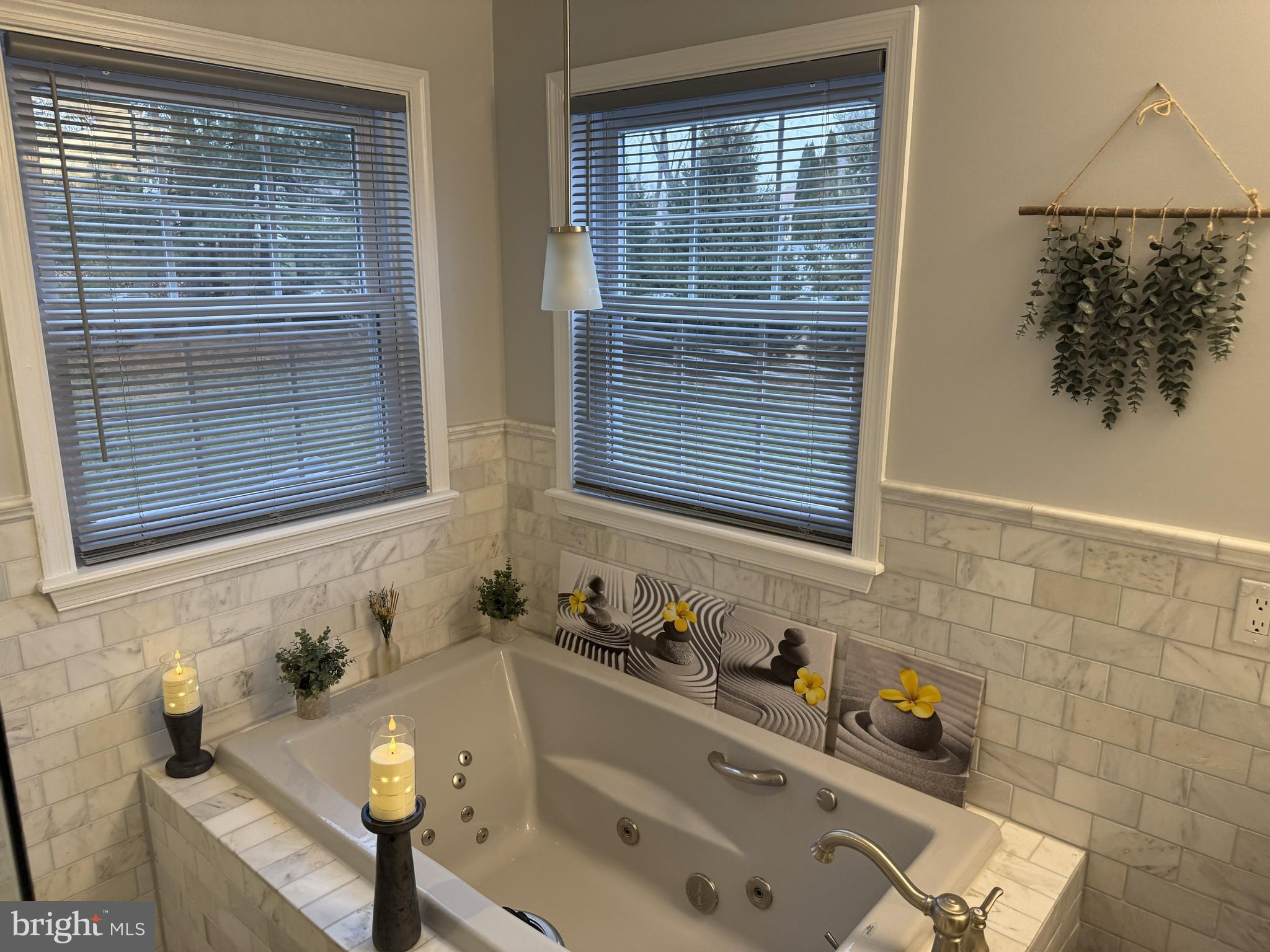 239 Heather Ridge Circle West Chester, PA 19382 - Photo 48 of 54 a bathroom with a tub sink and mirror