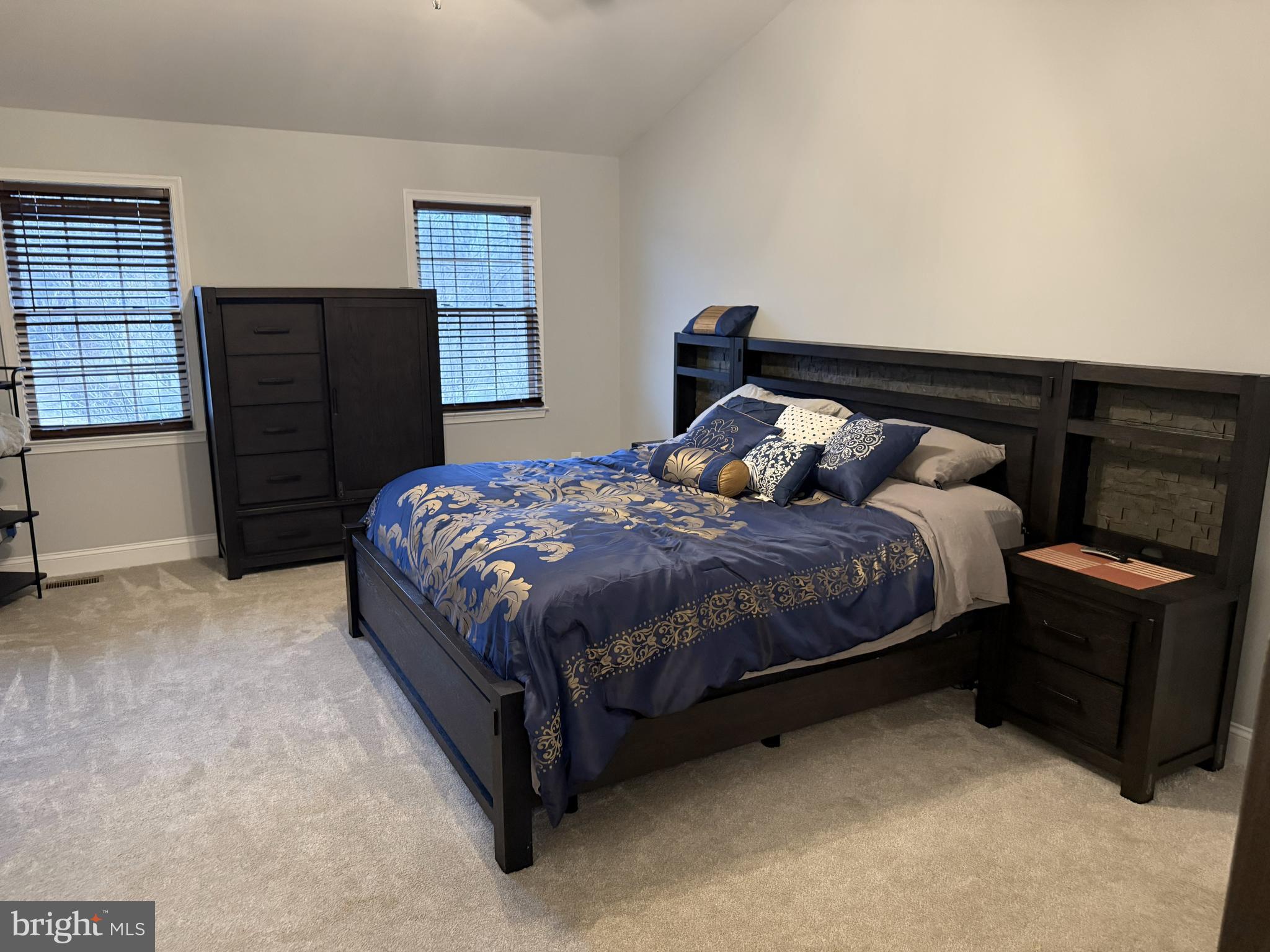 239 Heather Ridge Circle West Chester, PA 19382 - Photo 51 of 54 a bedroom with a bed and wooden floor