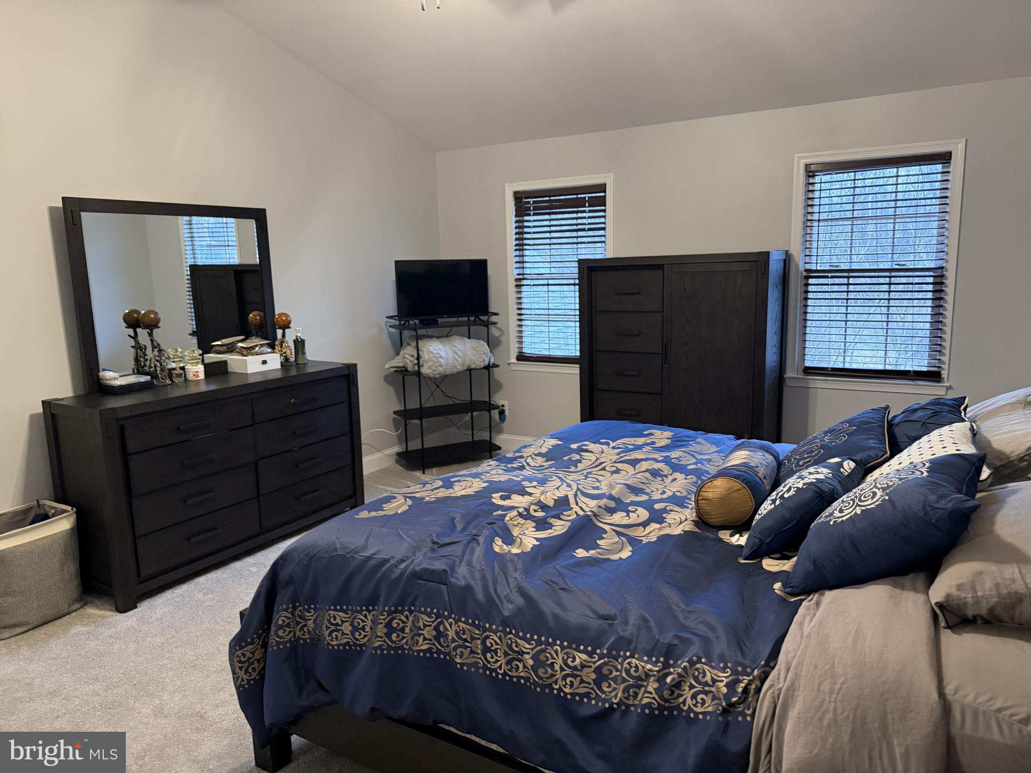 239 Heather Ridge Circle West Chester, PA 19382 - Photo 52 of 54 a bedroom with a bed and flat screen tv