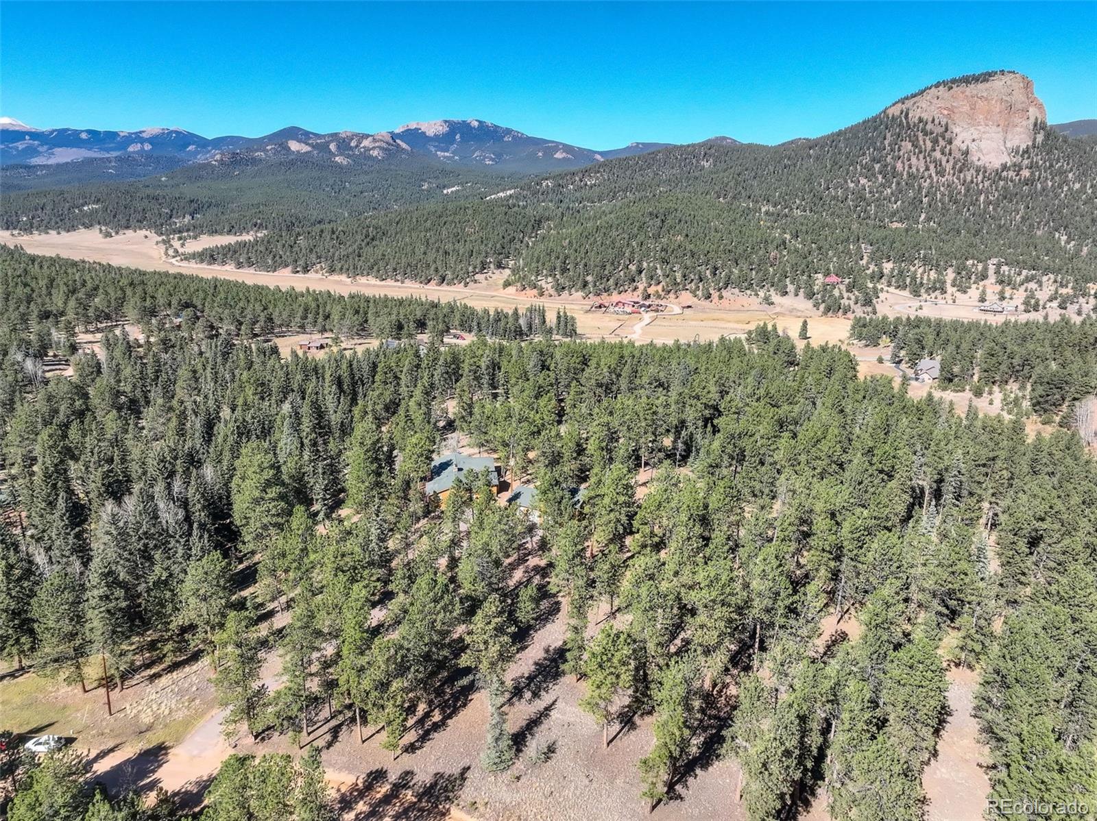 225 Spring Drive Pine, CO 80470 - Photo 26 of 44 a view of mountain with lake view
