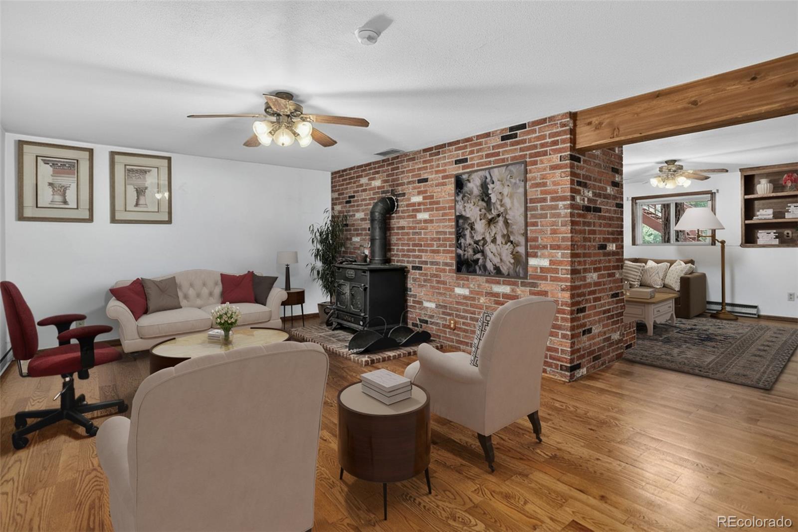 225 Spring Drive Pine, CO 80470 - Photo 35 of 44 a living room with furniture and a fireplace