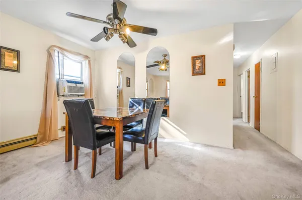 a view of a dining room with furniture