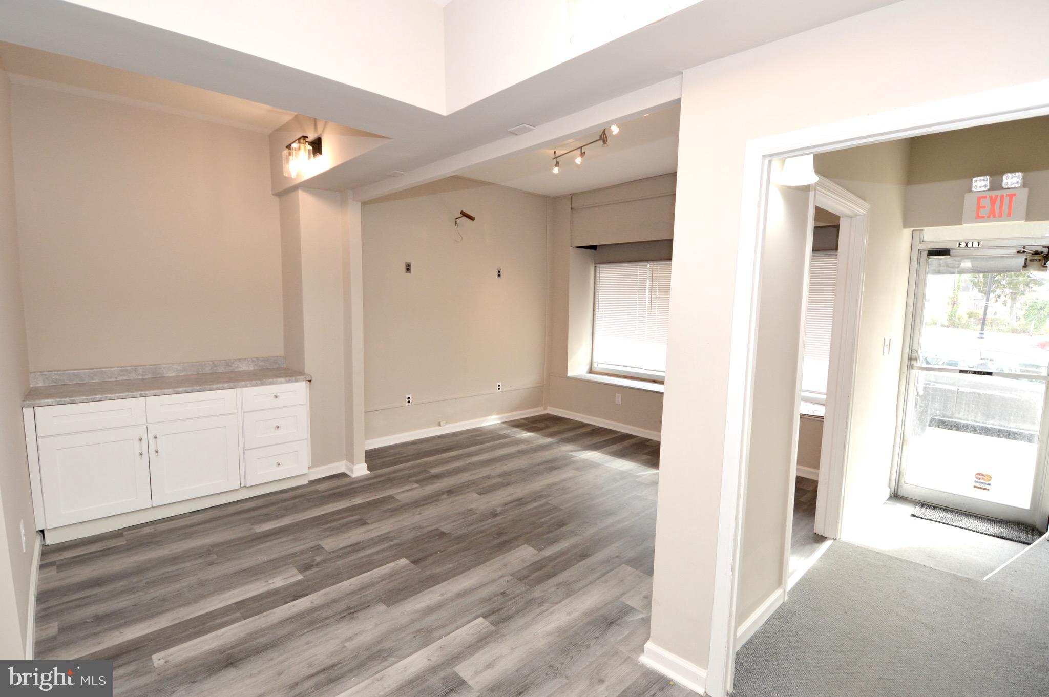 609 White Horse Pike Haddon Township, NJ 08107 - Photo 2 of 17 a view of a bathroom from the hallway
