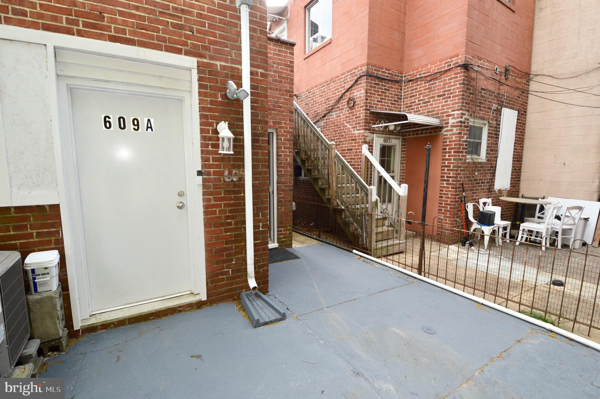 609 White Horse Pike Haddon Township, NJ 08107 - Photo 10 of 17 a view of a balcony with furniture and floor to ceiling window
