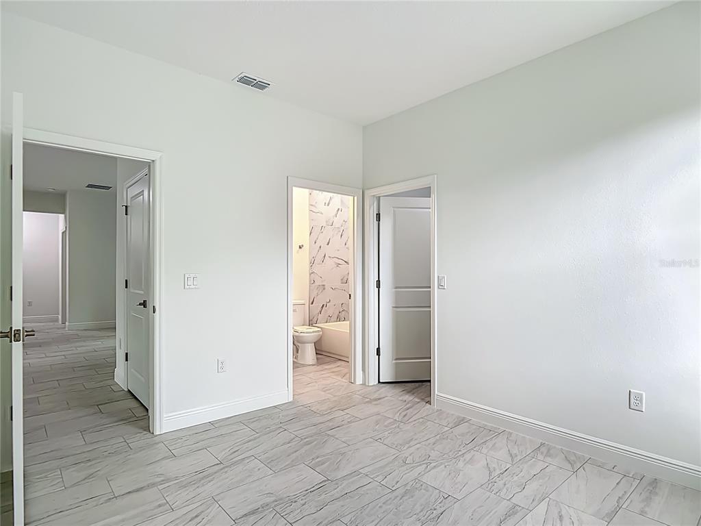 5736 North Claremont Drive Citrus Springs, FL 34434 - Photo 19 of 45 wooden floor in an empty room