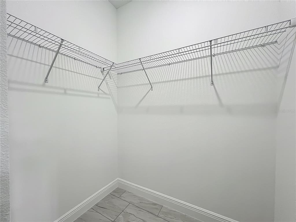 5736 North Claremont Drive Citrus Springs, FL 34434 - Photo 29 of 45 a view of a room with racks on the wall