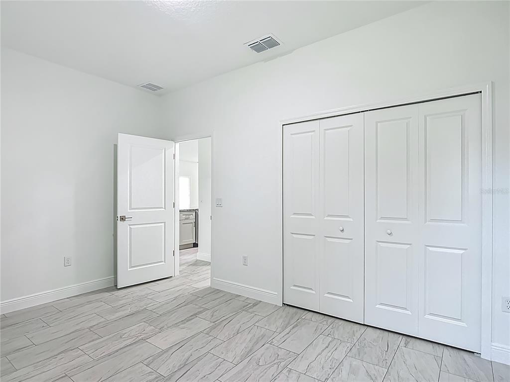 5736 North Claremont Drive Citrus Springs, FL 34434 - Photo 32 of 45 a view of empty room with wooden floor