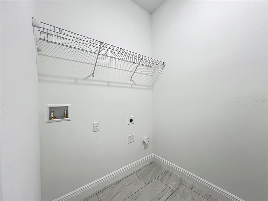 5736 North Claremont Drive Citrus Springs, FL 34434 - Photo 36 of 45 a view of a room with racks on the wall