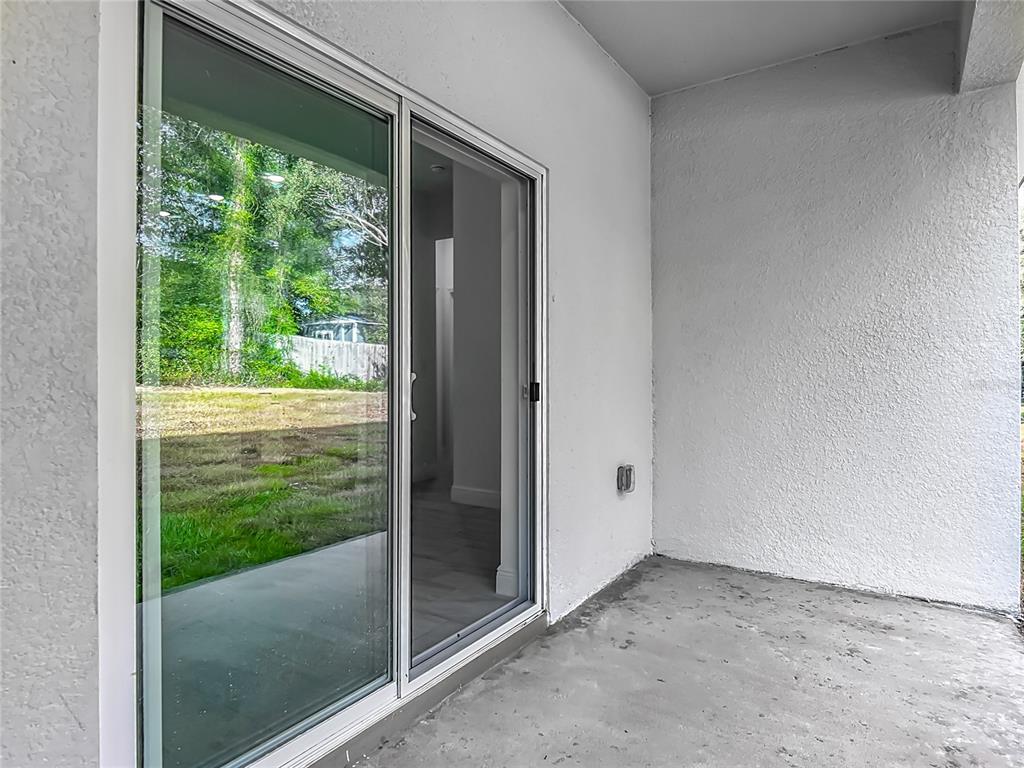 5736 North Claremont Drive Citrus Springs, FL 34434 - Photo 39 of 45 a view of a back yard from a room