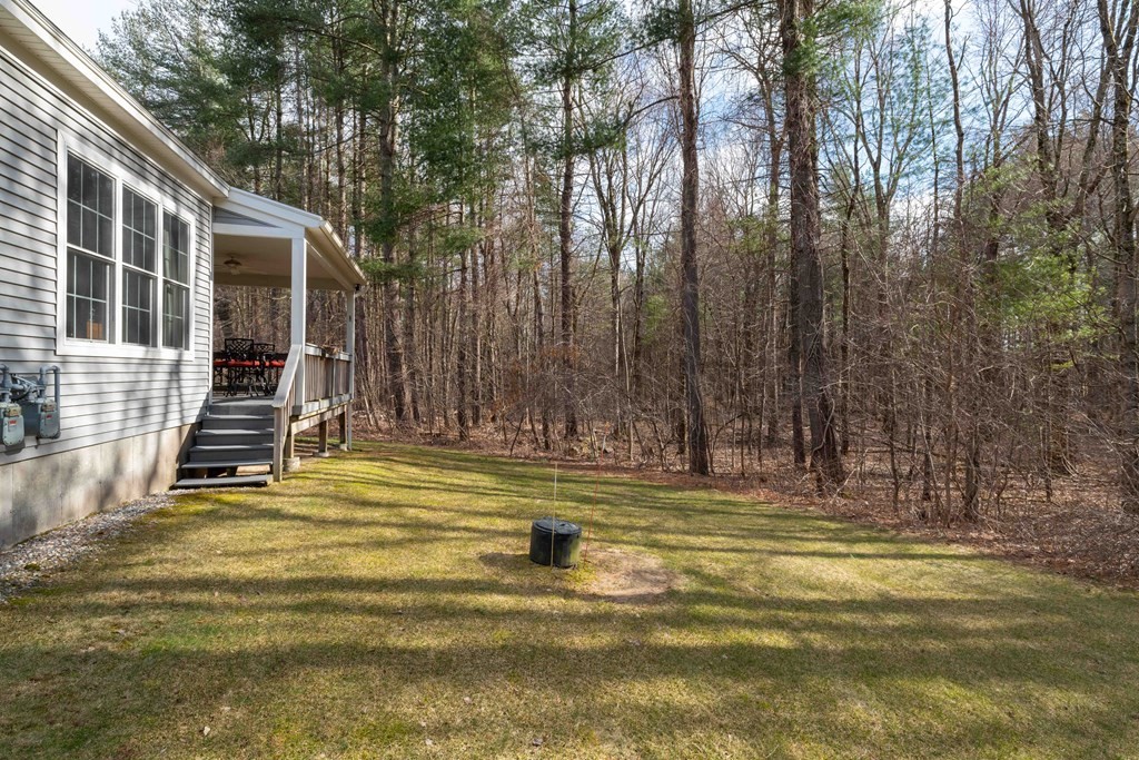 359 Main Street, Unit 15A Easthampton, MA 01027 - Photo 23 of 24 a view of swimming pool with outdoor seating and yard
