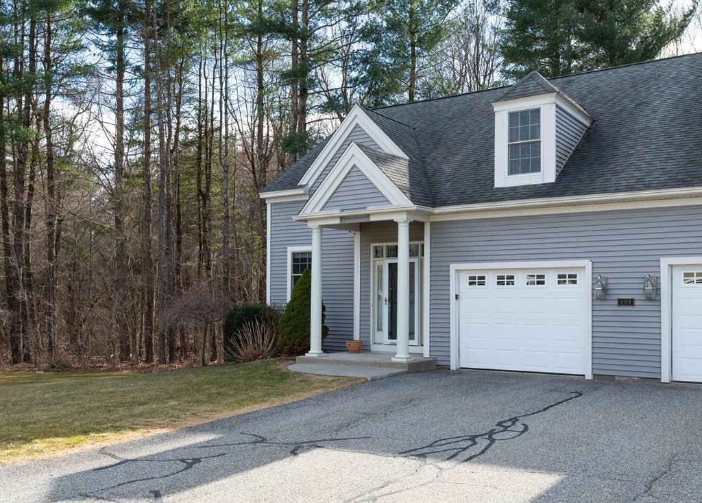 359 Main Street, Unit 15A Easthampton, MA 01027 - Photo 24 of 24 a view of a house with a yard and large tree