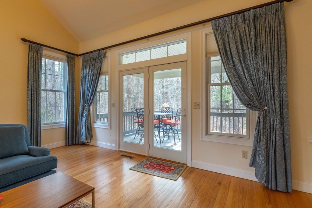 359 Main Street, Unit 15A Easthampton, MA 01027 - Photo 9 of 24 a view of livingroom with furniture and wooden floor