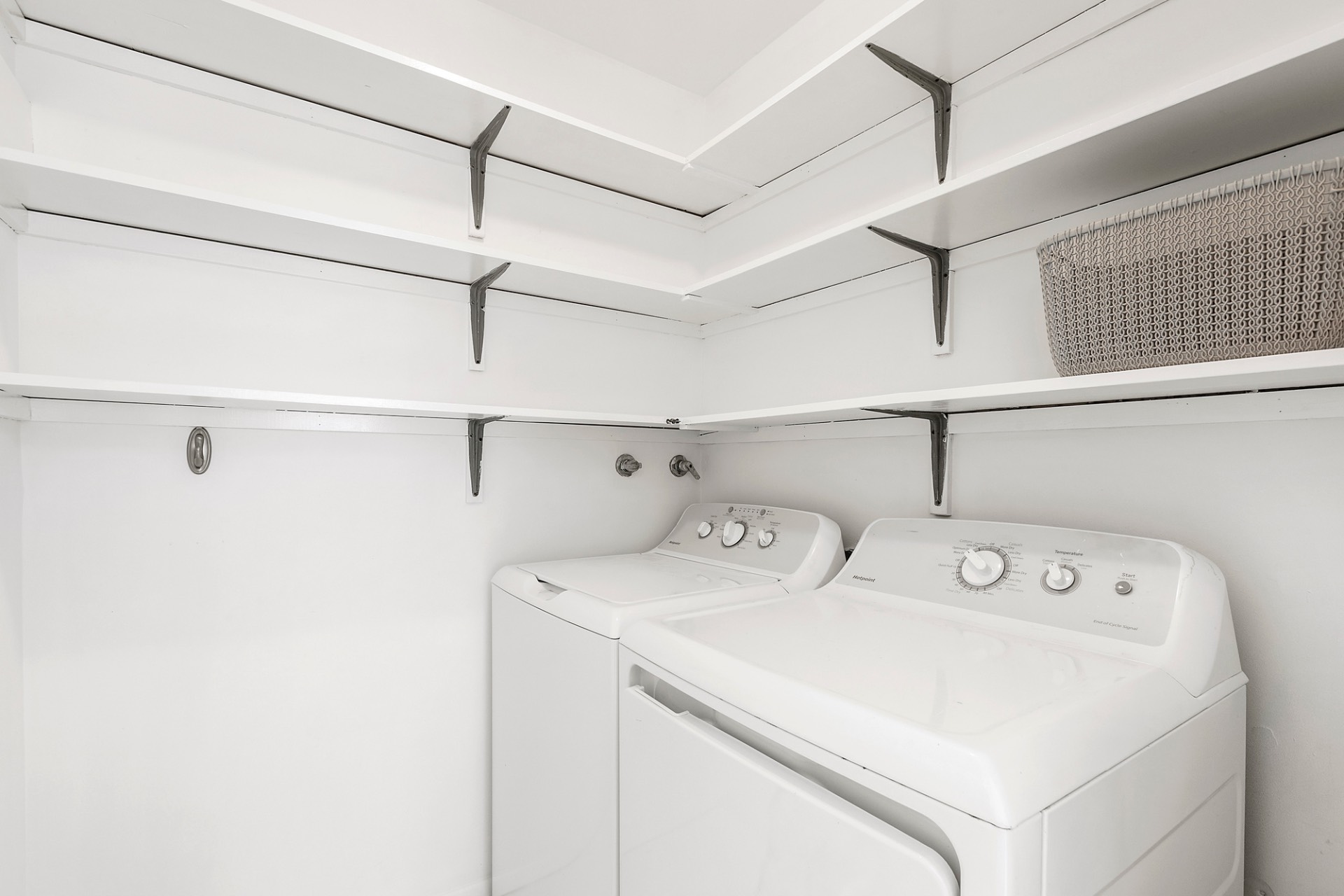 219 Town Line Road Wainscott, NY 11975 - Photo 15 of 19 a utility room with dryer and washer