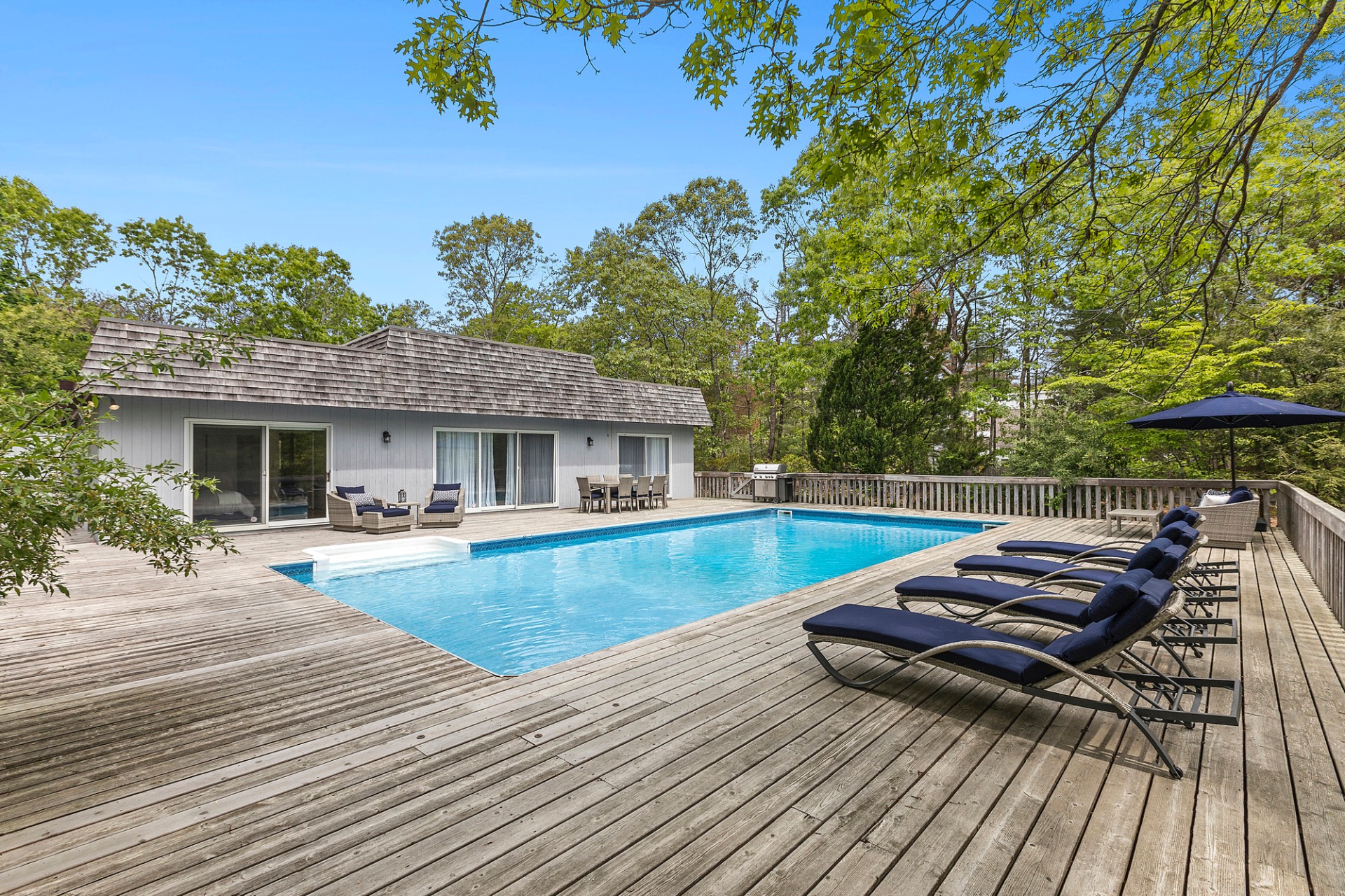 219 Town Line Road Wainscott, NY 11975 - Photo 19 of 19 swimming pool view with a seating space