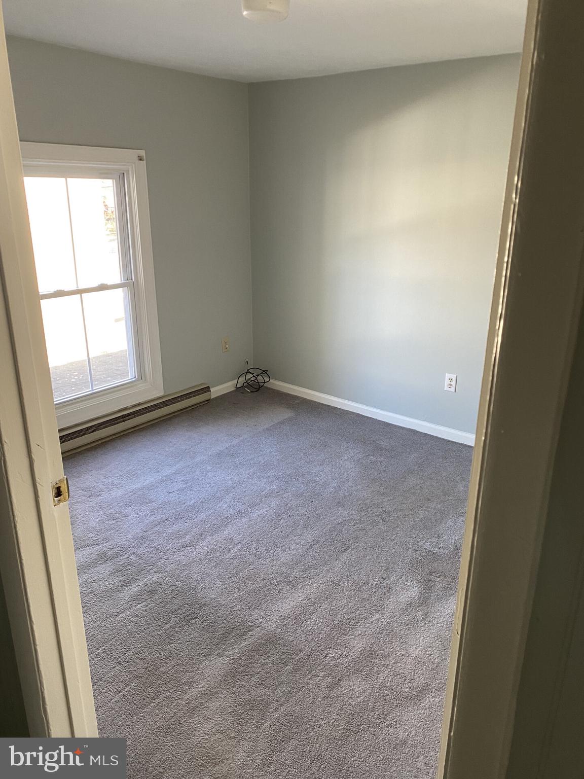 321 Choptank Avenue Cambridge, MD 21613 - Photo 6 of 15 an empty room with a window