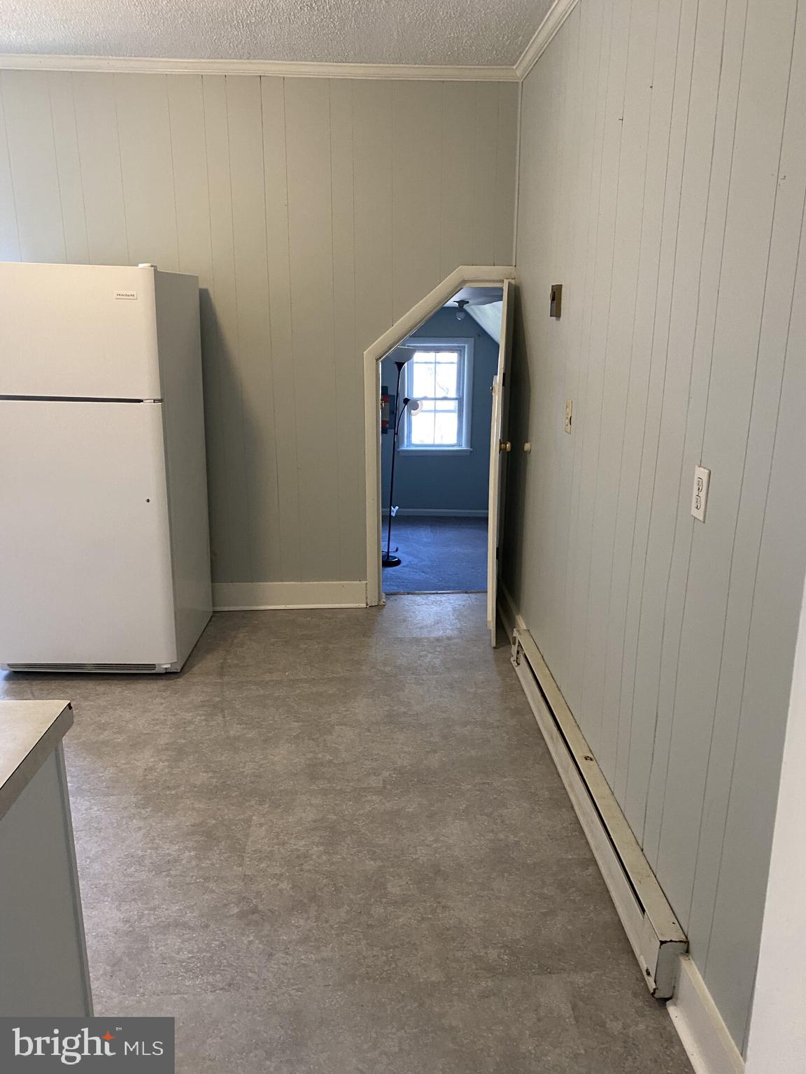 321 Choptank Avenue Cambridge, MD 21613 - Photo 9 of 15 a view of a hallway with wooden floor