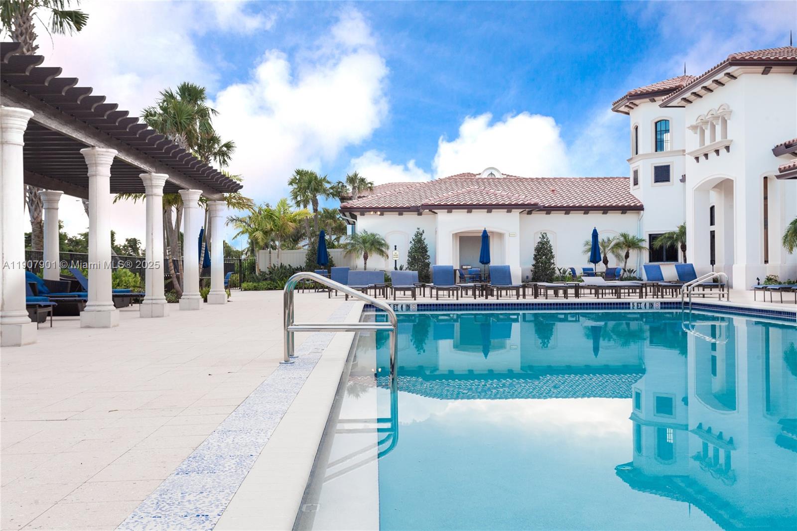 11670 Southwest 13th Lane, Unit 11670 Pembroke Pines, FL 33025 - Photo 35 of 38 a view of a house with a swimming pool