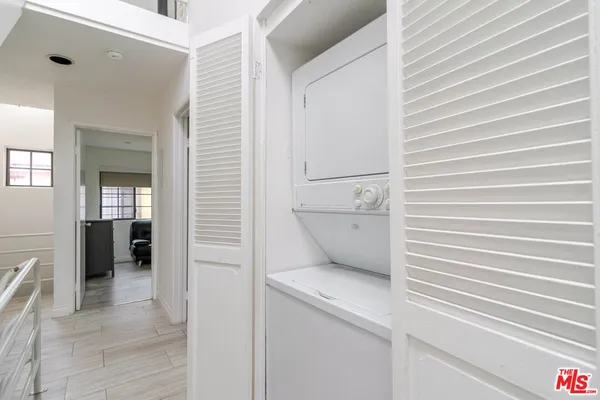 a view of parking garage with cars