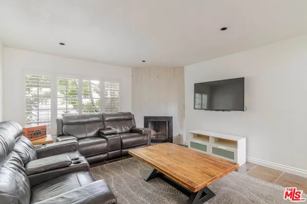 a view of staircase with white walls