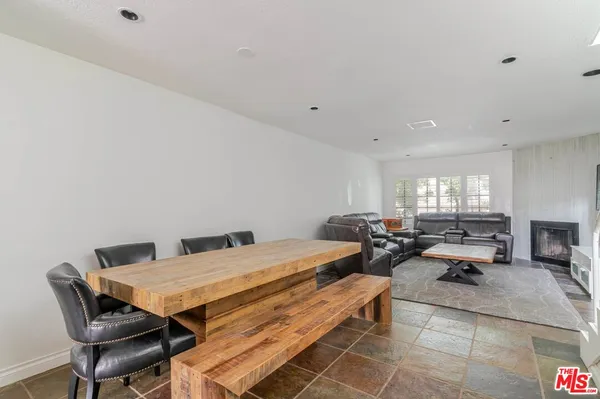 a kitchen with a sink and a refrigerator