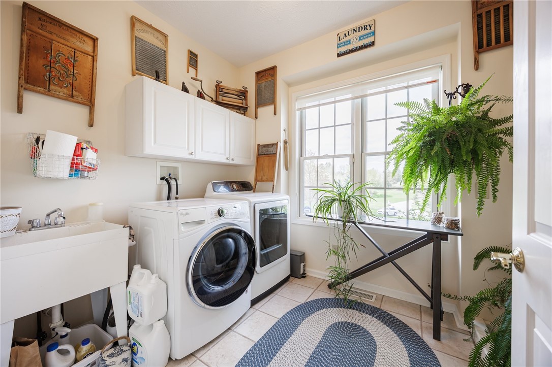 7638 Pine Tree Drive Victor, NY 14564 - Photo 22 of 50 Light filled laundry room off the mudroom