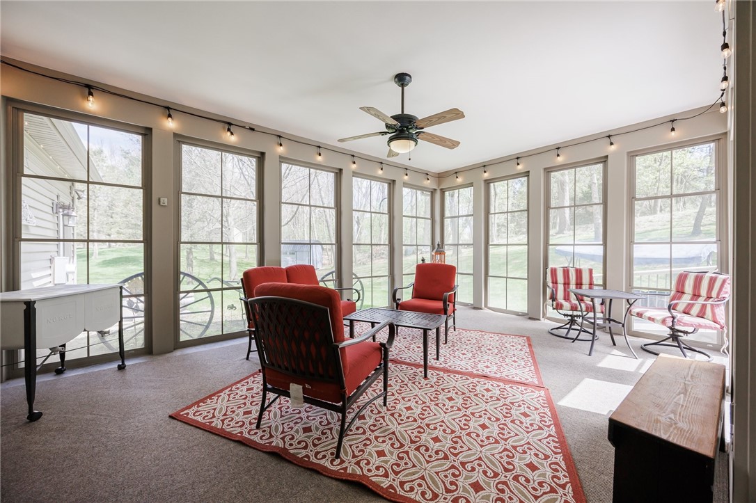 7638 Pine Tree Drive Victor, NY 14564 - Photo 23 of 50 Fabulous porch with custom windows that open up to