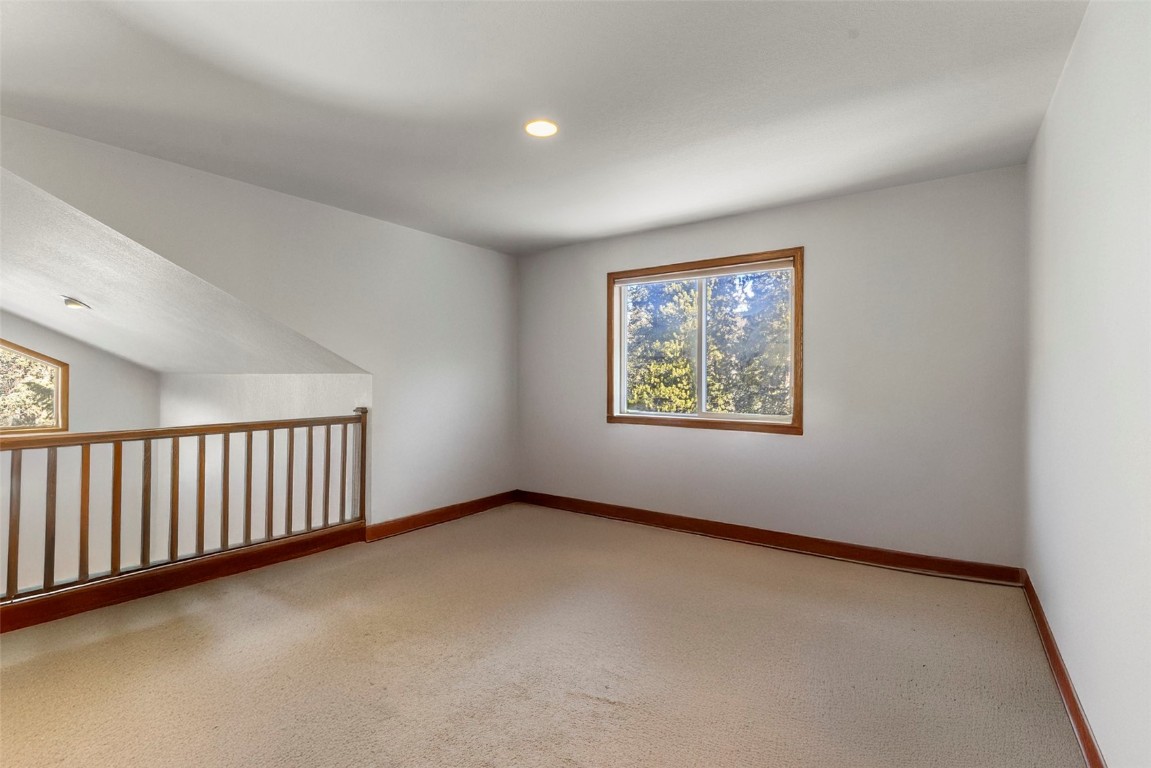 617 Moonstone Road Breckenridge, CO 80424 - Photo 17 of 21 a view of an empty room with a window