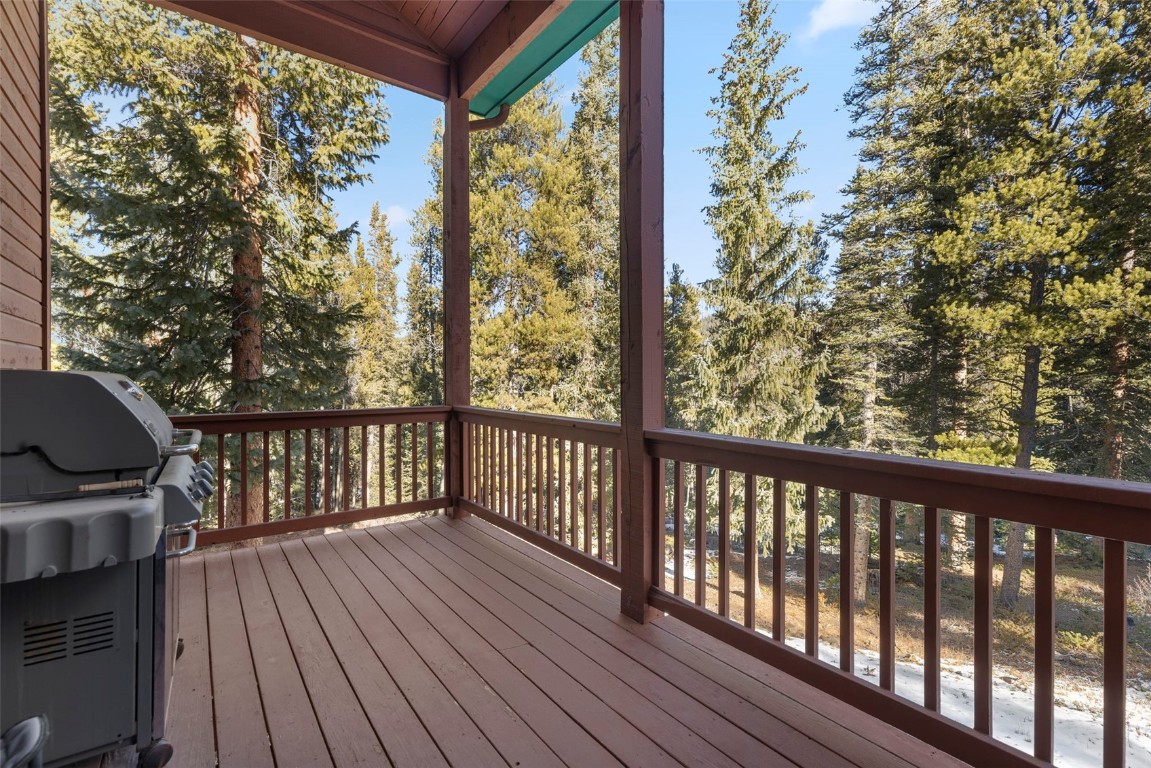 617 Moonstone Road Breckenridge, CO 80424 - Photo 4 of 21 a view of balcony with wooden floor and fence