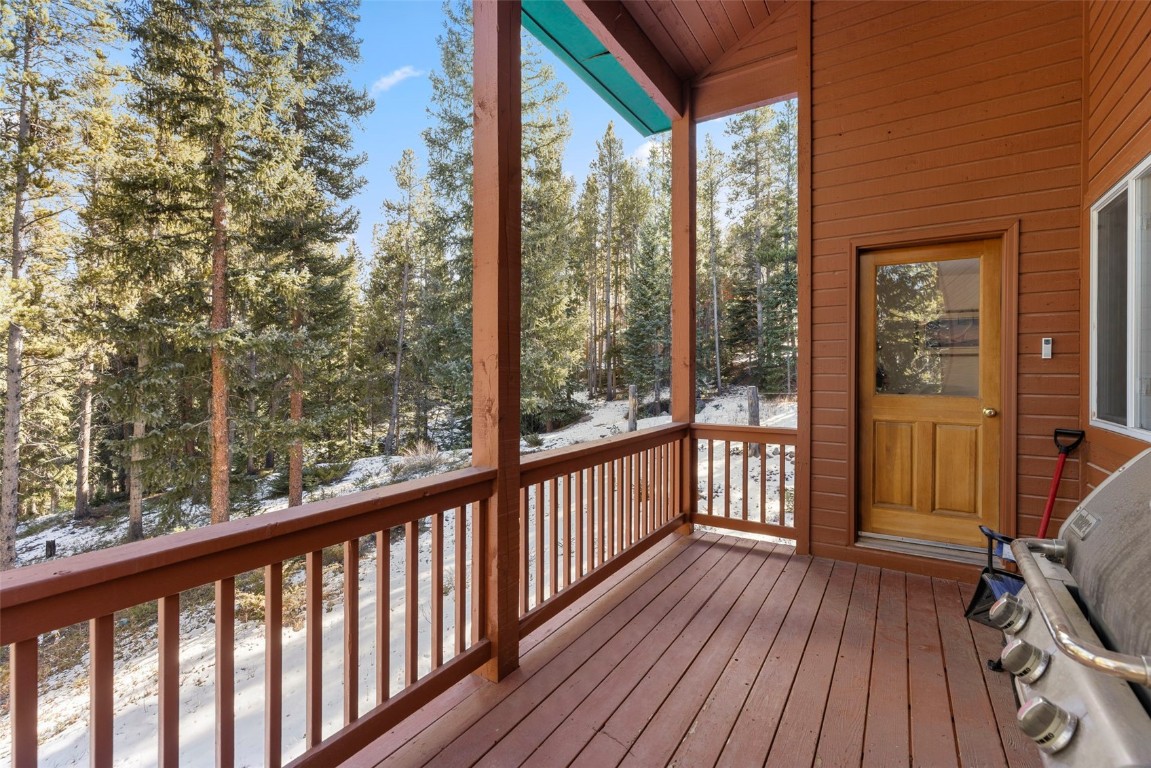 617 Moonstone Road Breckenridge, CO 80424 - Photo 5 of 21 a view of a balcony with wooden floor